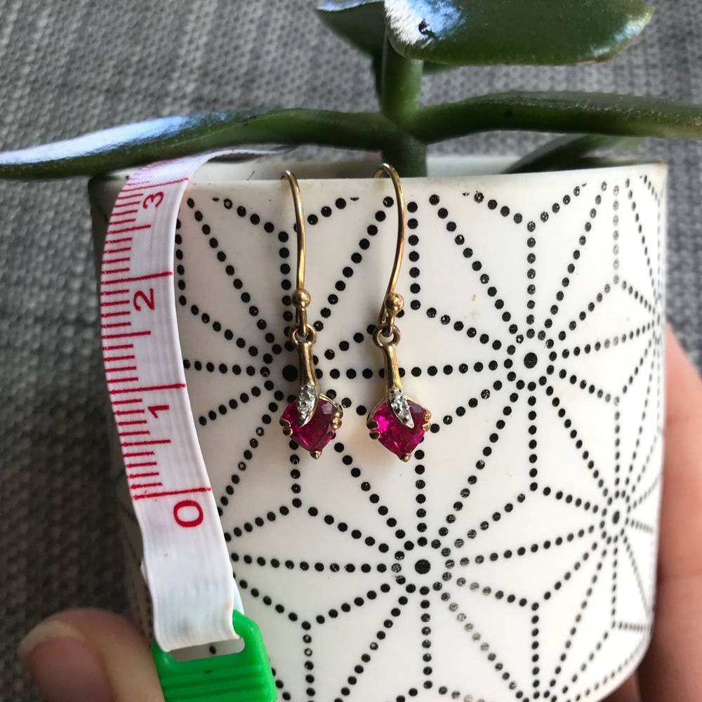 Ruby and gold heart earrings.